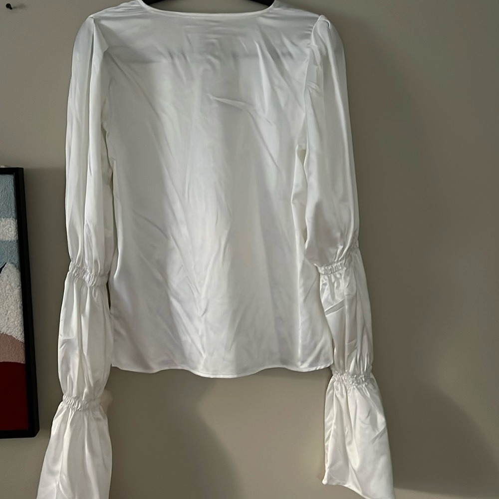 White top with tiered sleeves